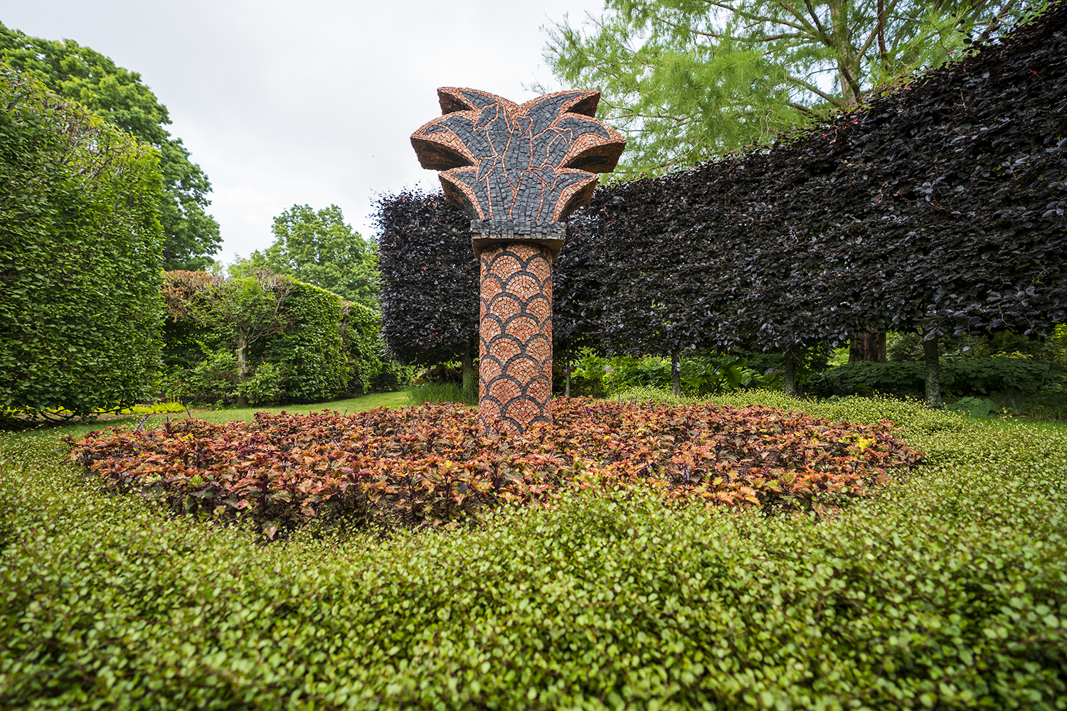 Shelter Island artist Ned Smyth’s mosaic sculpture Solomon Palm installed on the 17-acre property of Landcraft Foundation.