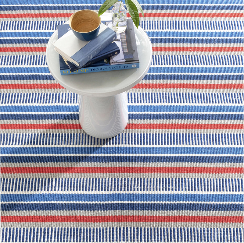 red, white, and blue colored indoor-outdoor rug