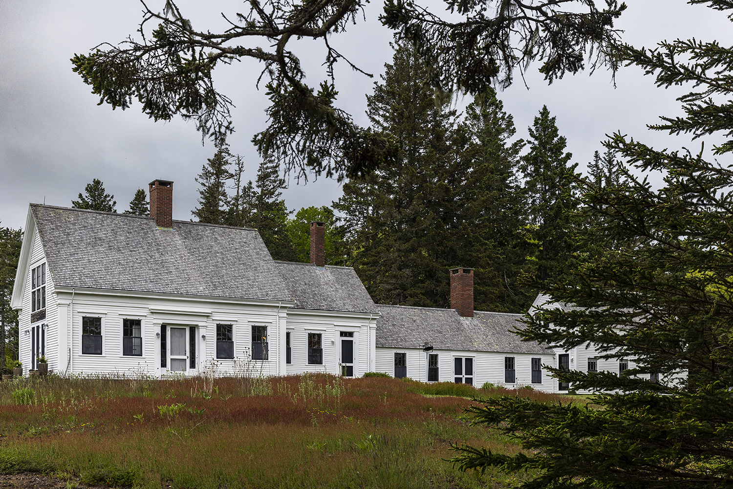 The property features a big house, little house, back house and barn.