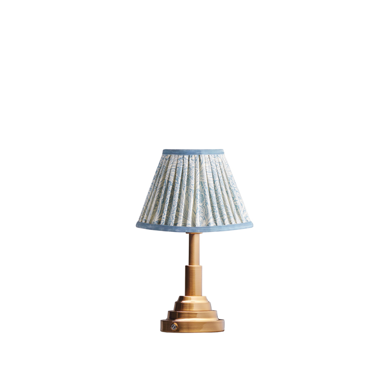 Ernest cordless table lamp with shade by Morris & Co. for Pooky is recommended for a guest room.