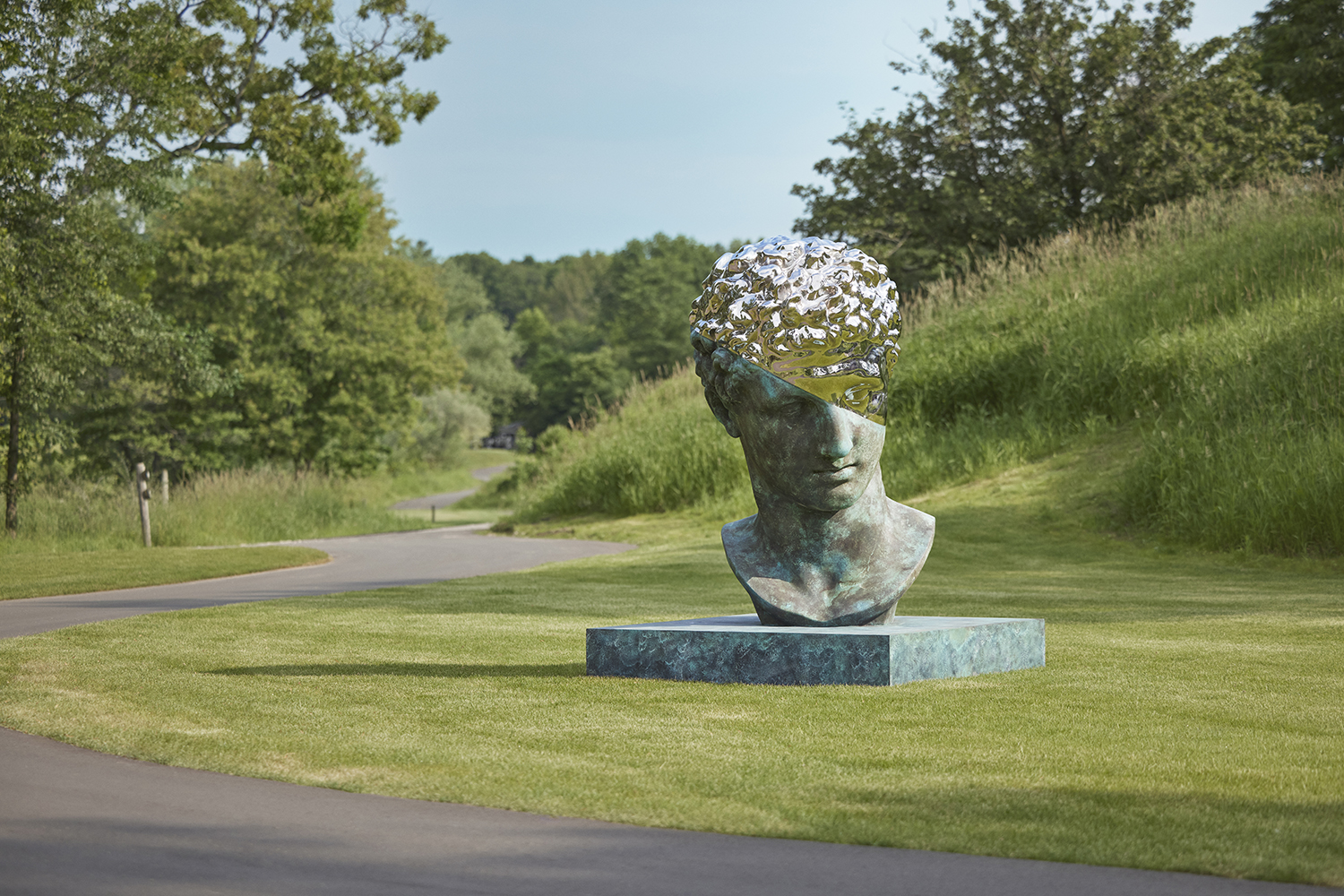 Amalgamized head of Hermes of Olympia by Daniel Arsham installed on the beautiful Meadow Valleys golf course at Blackwolf Run in Wisconsin.