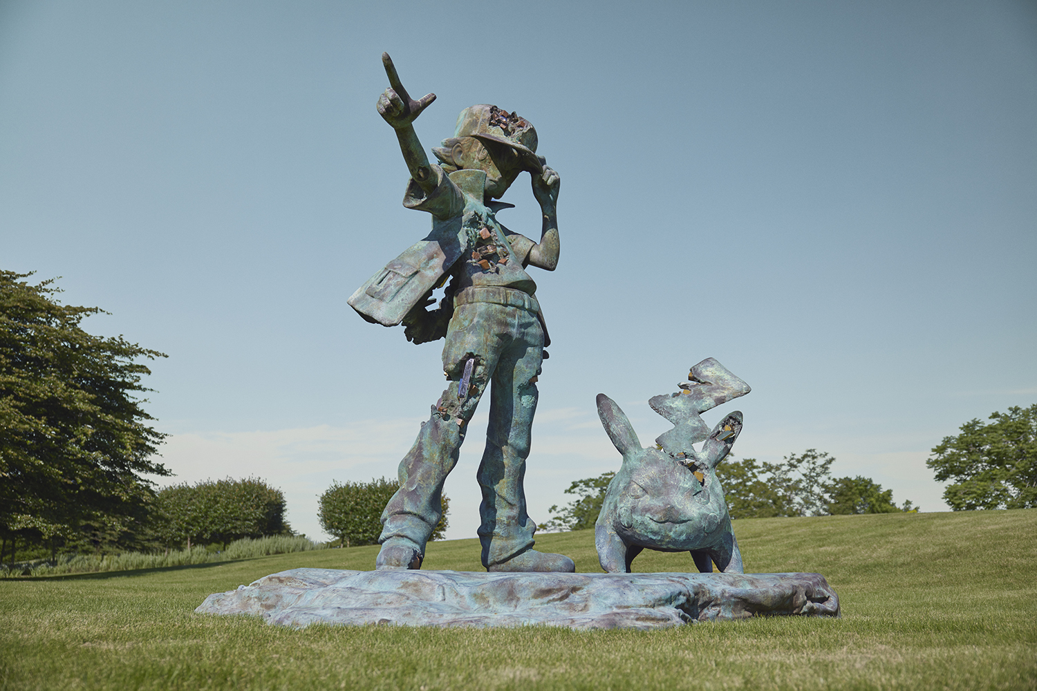 Bronze Eroded Pokémon and Trainer by Daniel Arsham, installed at Destination Kohler's The Shops at Woodlake.