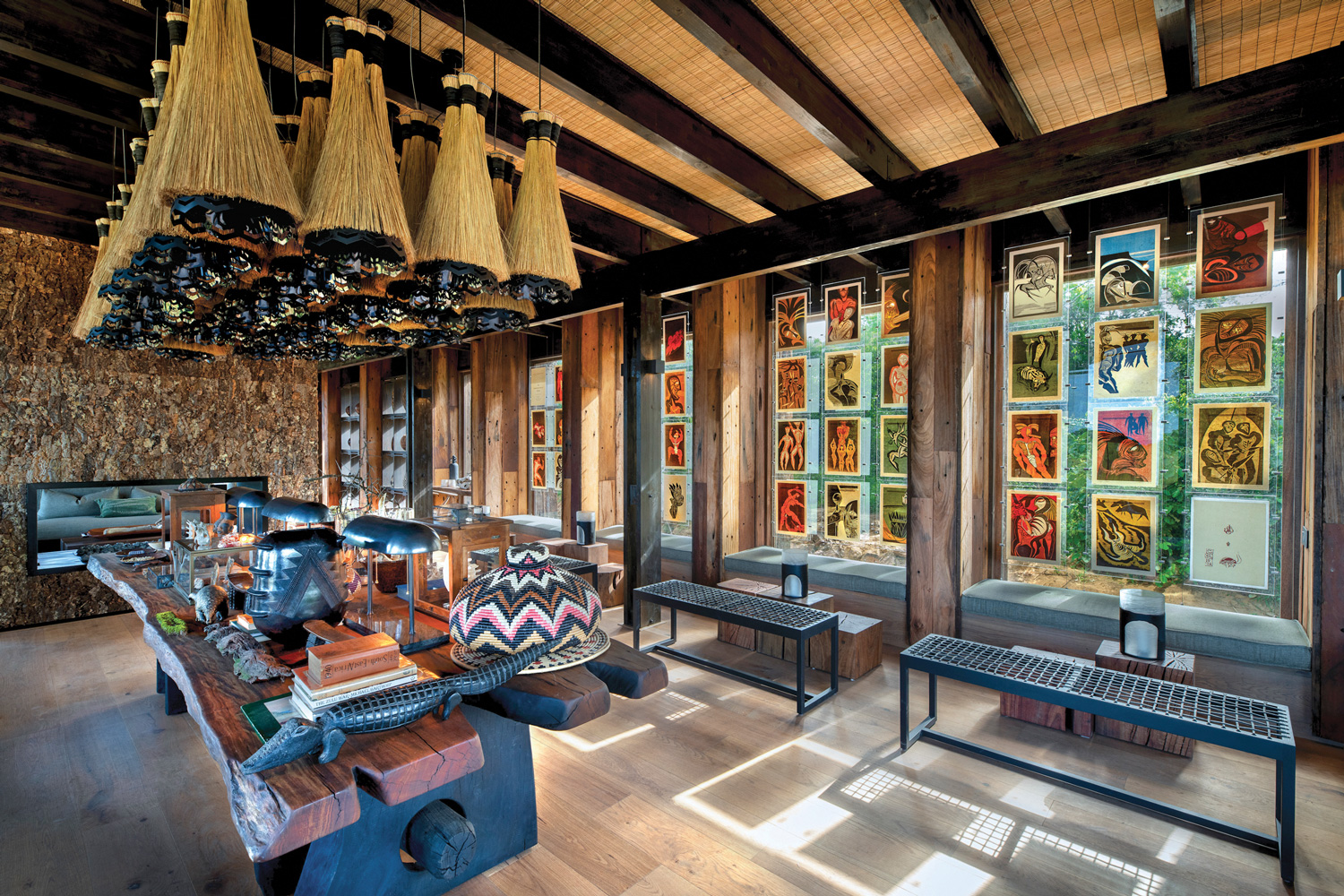 A collection of Cecil Skotnes woodcuts animates the library at andBeyond Phinda Forest Lodge in South Africa.
