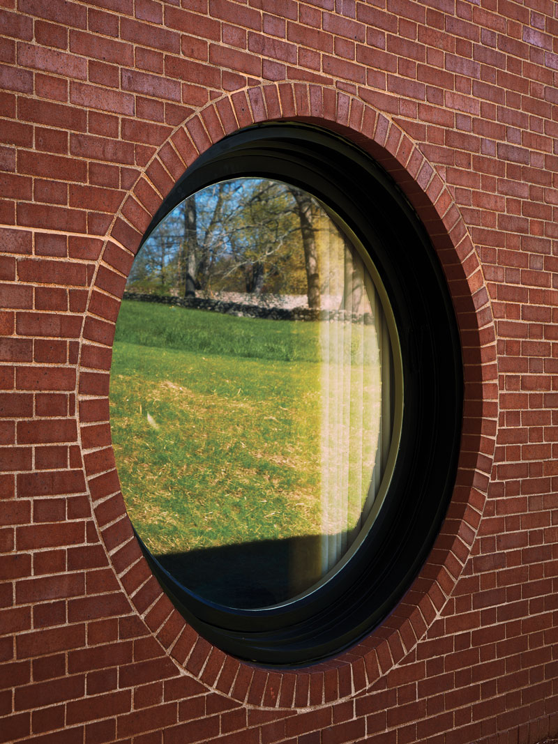 One of the three portal windows in Philip Johnson's Brick House, which is a contrast to his Glass House.