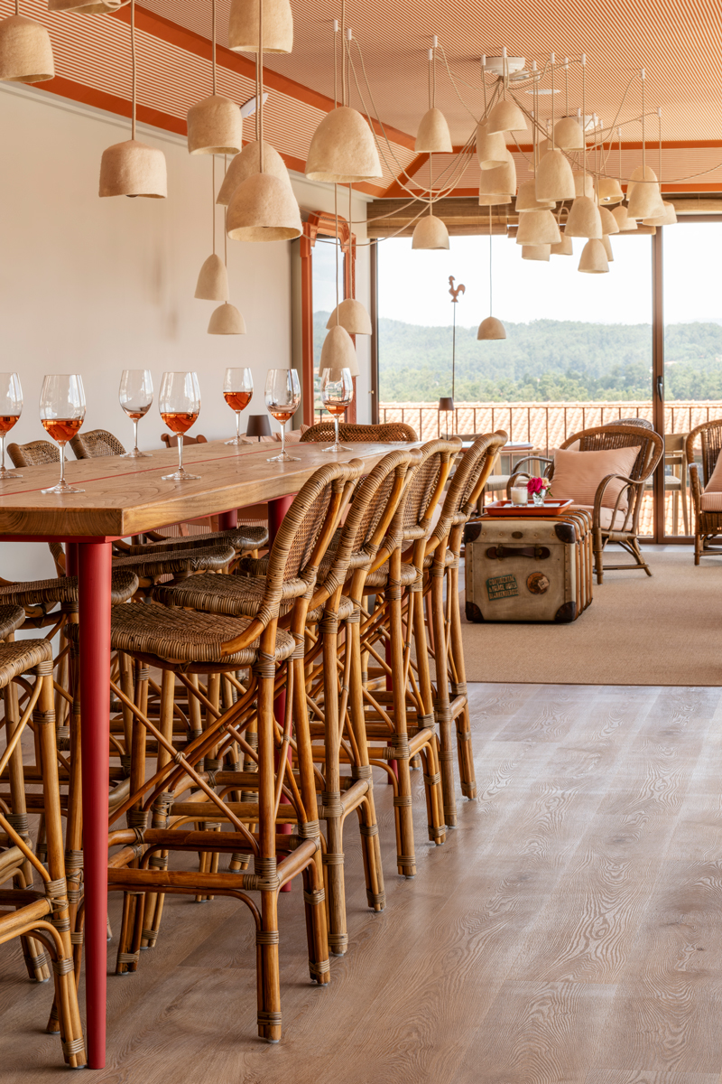 The lounge in the Modern Building at Solar de Vila Meā in Barcelos, Portugal features Joana Aranha Signature tables set with Eichholtz chairs.