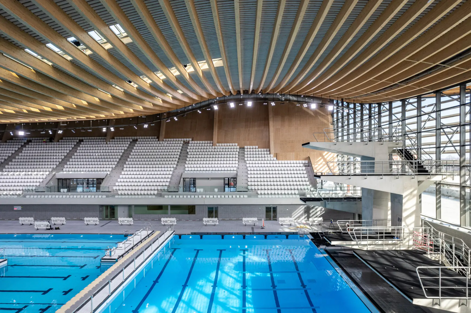 Paris Olympics Aquatics Centre designed by VenhoevenCS and Ateliers 2/3/4.