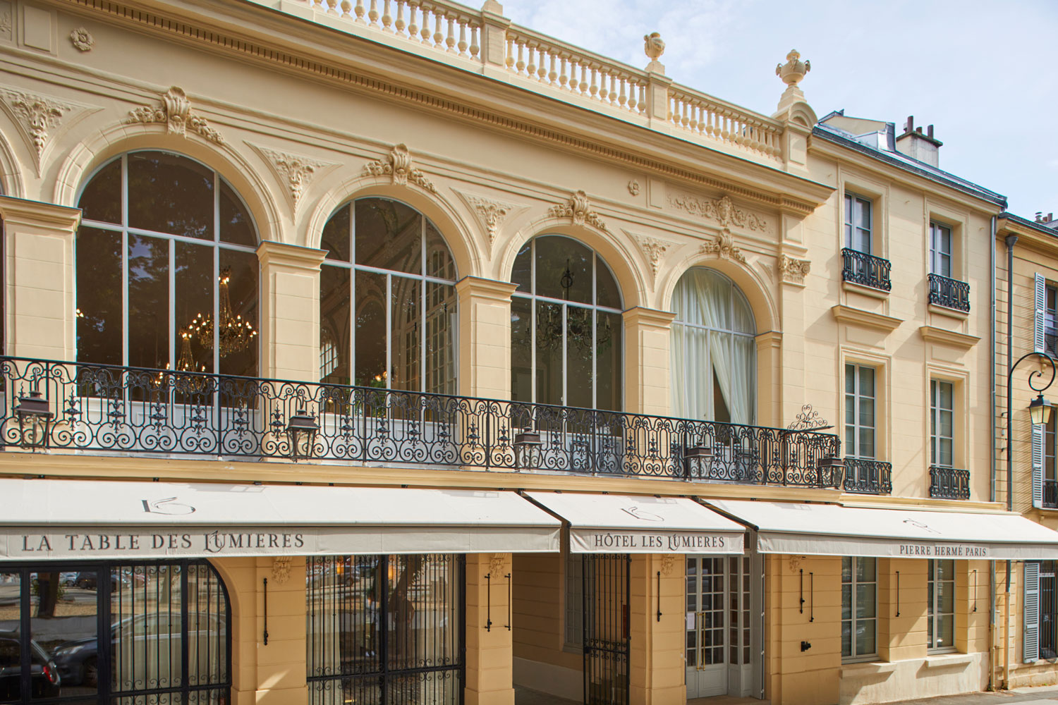 The facade of Hotel Les Lumières.