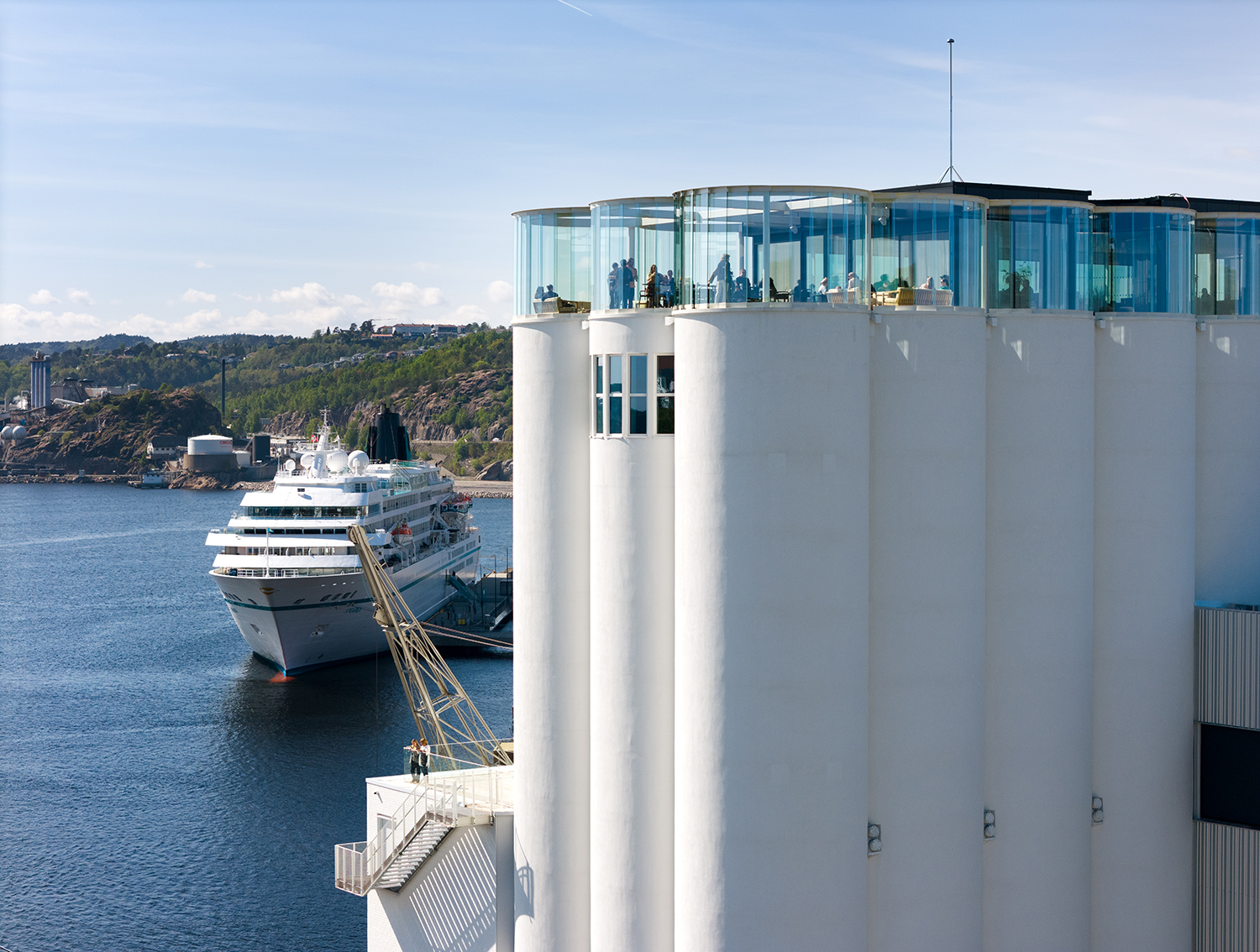 Kunstsilo, a new museum of Nordic Art, a opened in Kristiansand, Southern Norway. The 8,500 square-meter building emerges on the waterfront in the peninsula of Odderøya, and integrates for the first time the Southern Norway Art Museum and the prestigious Tangen Collection of Nordic art.