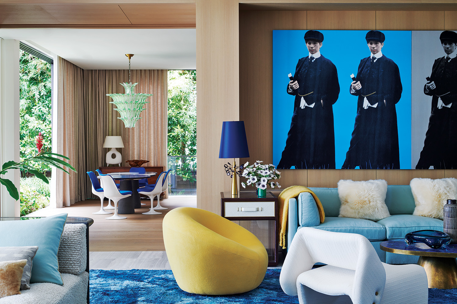 The painting Double Double Yentl (My Elvis) by Deborah Kass presides over the living room of a Miami Beach home renovated by William T. Georgis.