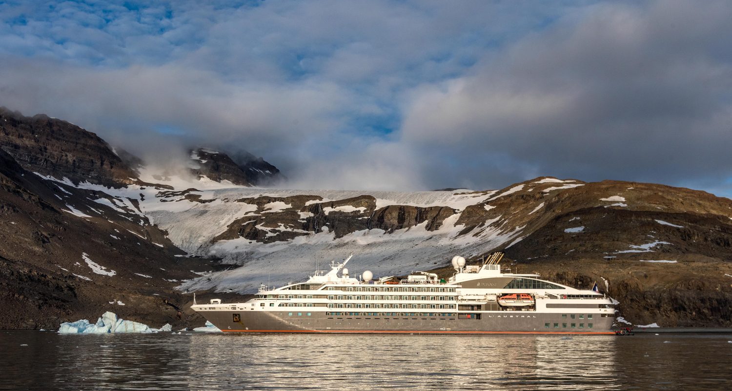 A Ponant vessel outside Kangerlugssuaq, Greenland, which is on the 2025 travel destinations list.