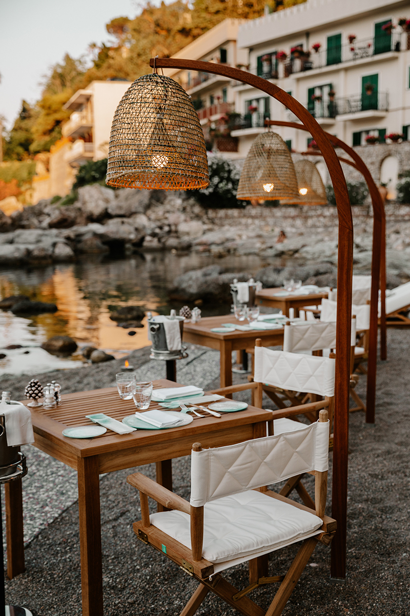 Brizza restaurant at Lido Villeggiatura beach club at Villa Sant' Andrea, a Belmond hotel, in Taormina Mare, Sicily.