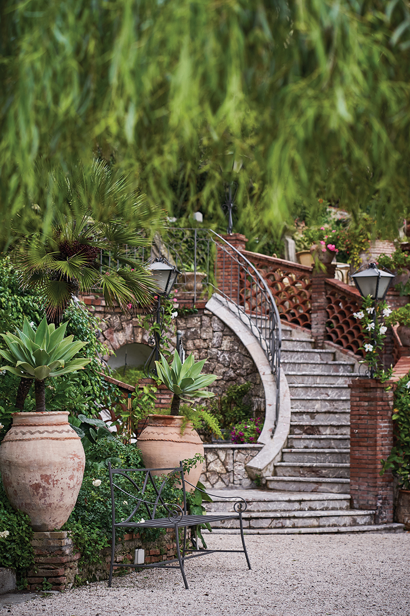 Beautiful gardens are just one of the many enchanting features at Villa Sant' Andrea, a Belmond hotel in Taormina Mare.