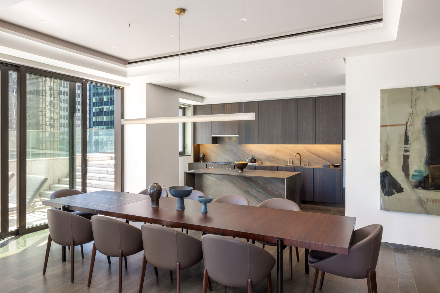 The kitchen and dining room space in the listing located in the historic Crown Building.