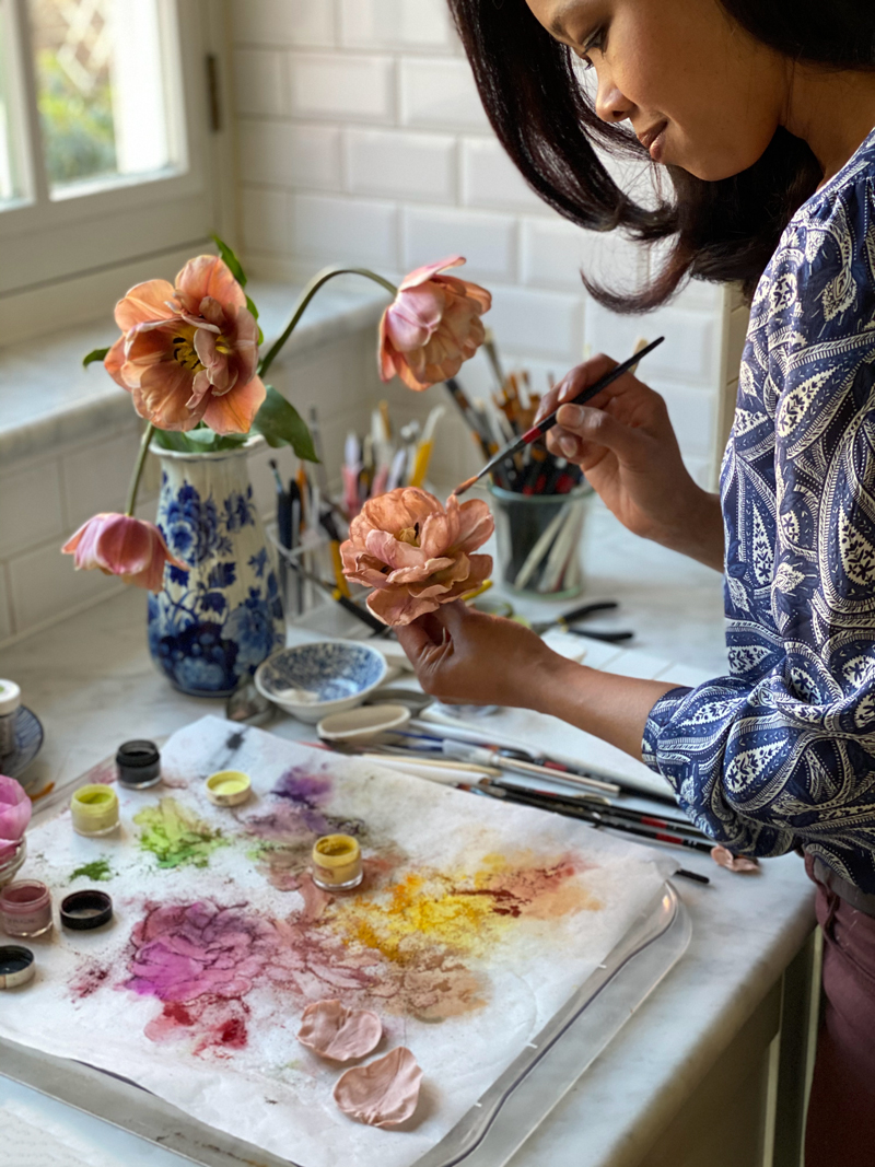 Artisan Natasja Sadi at work on some of her hyperrealistic flowers made from sugar paste.