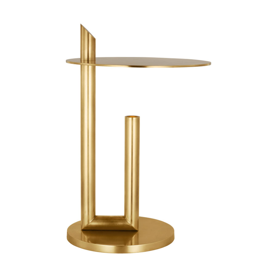 On the list of office essentials is a Fielle table lamp by Kelly Wearstler for Visual Comfort