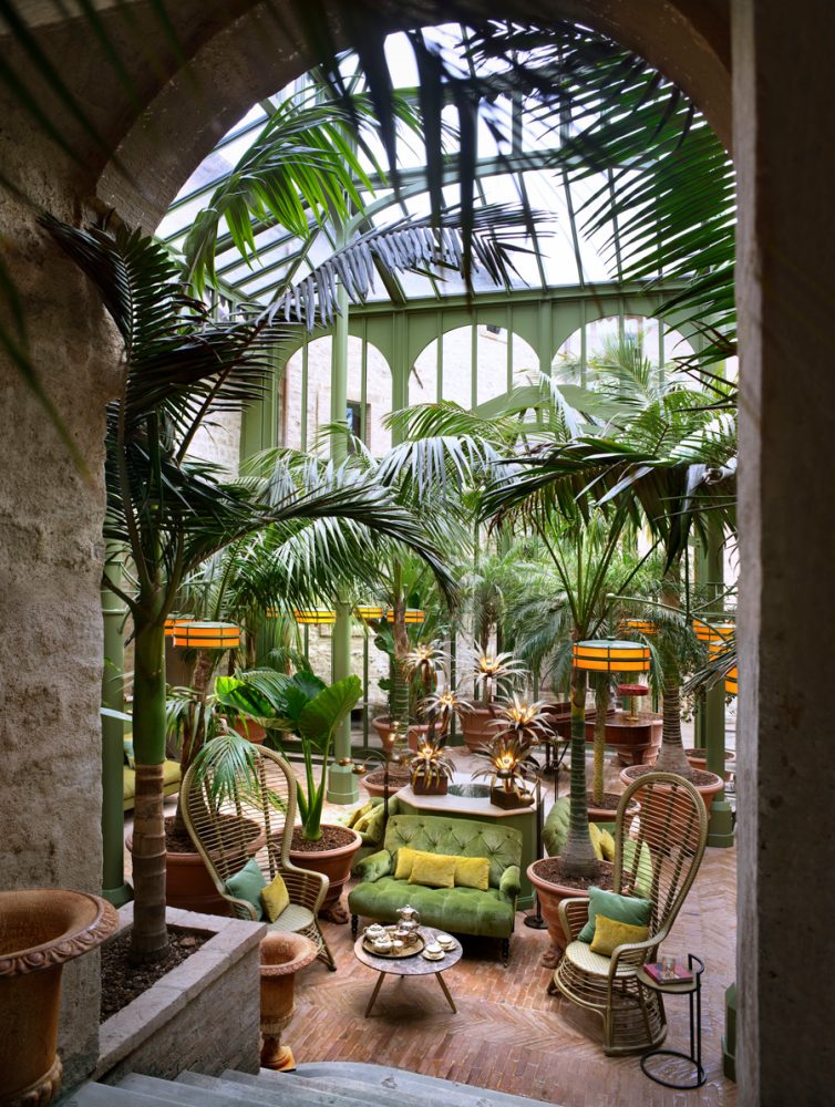 The palm court at the Reschio Hotel in Umbria, Italy.