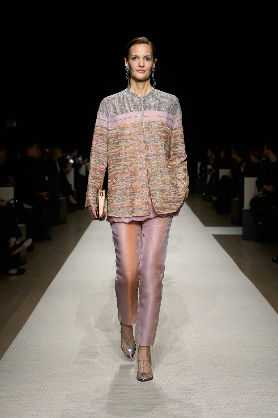 The Giorgio Armani Spring/Summer 2025 collection blended influences from the East, desert winds.