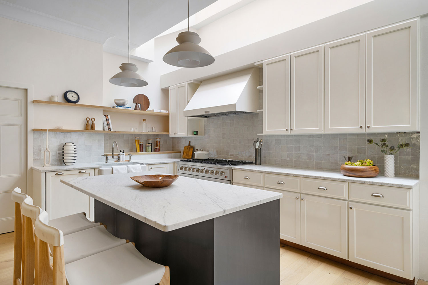 The West Village listing features a kitchen with marble countertops.