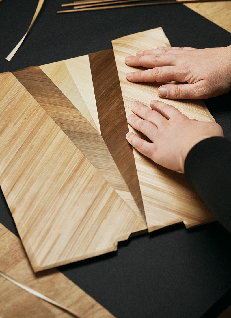 The Secretaire Bureau 2.0 features an interior of straw marquetry.