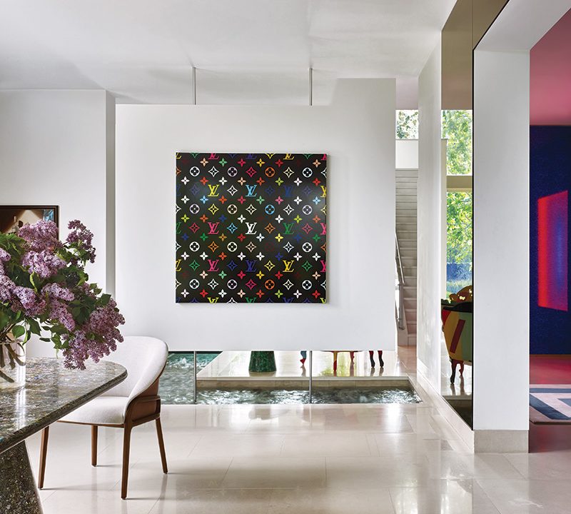 A Takashi Murakami painting chosen by Ernest de la Torre lends visual punch to the room.