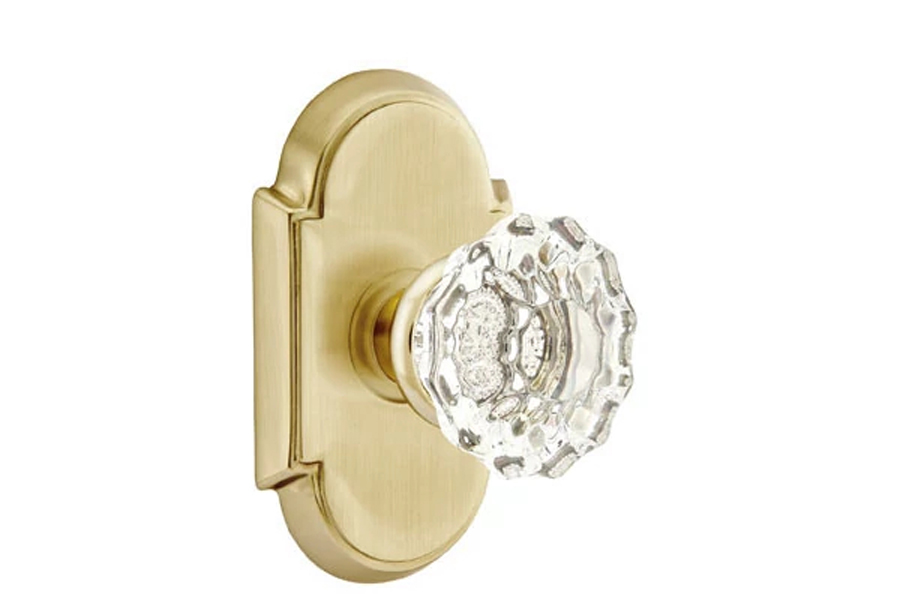 Astoria Knob with #8 Rosette in Unlacquered Brass by Emtek.