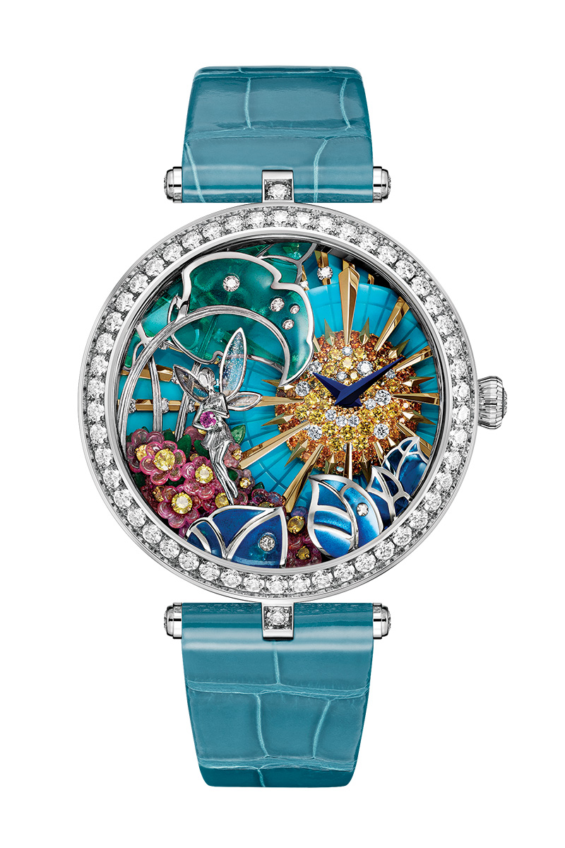 The Lady Arpels Jour Enchanté watch by Van Cleef & Arpels features diamonds, sapphires, and turquoise, among other gems, set in 18K yellow and white gold.