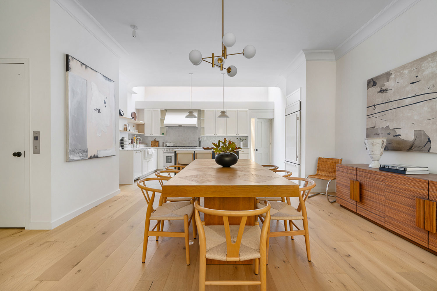 The West Village home features an eat-in kitchen and dining area.