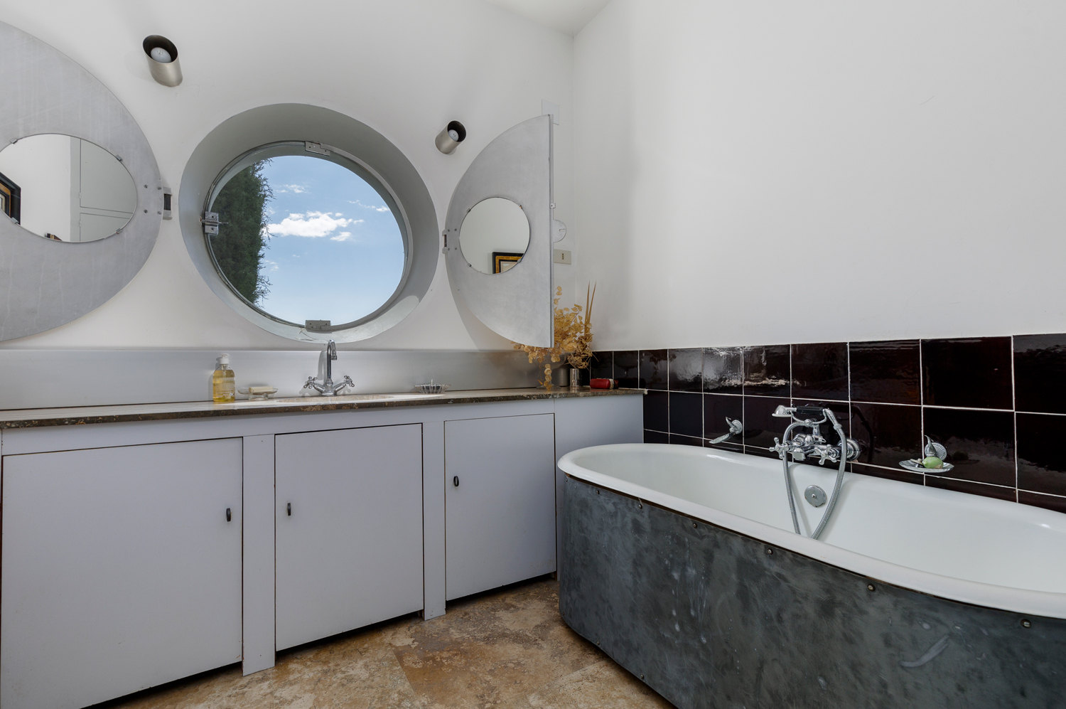 Eileen Gray completed the home 90 years ago. Today, a zinc bathtub remains.