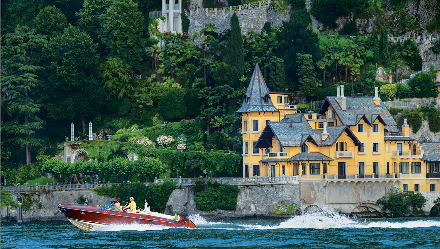 Pascal Cagni, a former Apple executive and founding partner of the investment fund C4 Ventures, captains a Colombo 32 Romance motorboat in front of his family’s Villa Cagni Troubetzkoy on Lake Como.