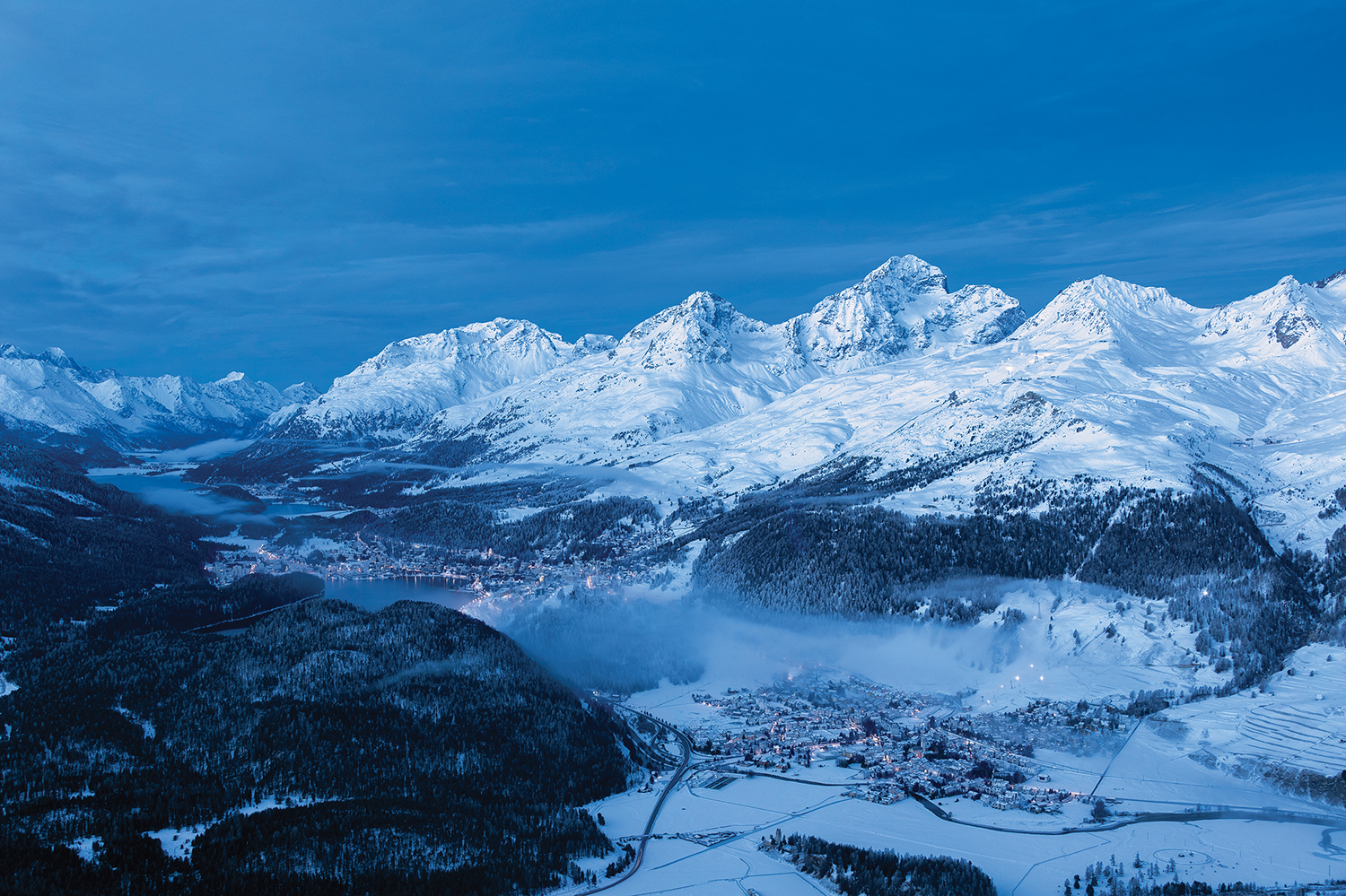 Snow-laden peaks of the Upper Engadin in Switzerland.