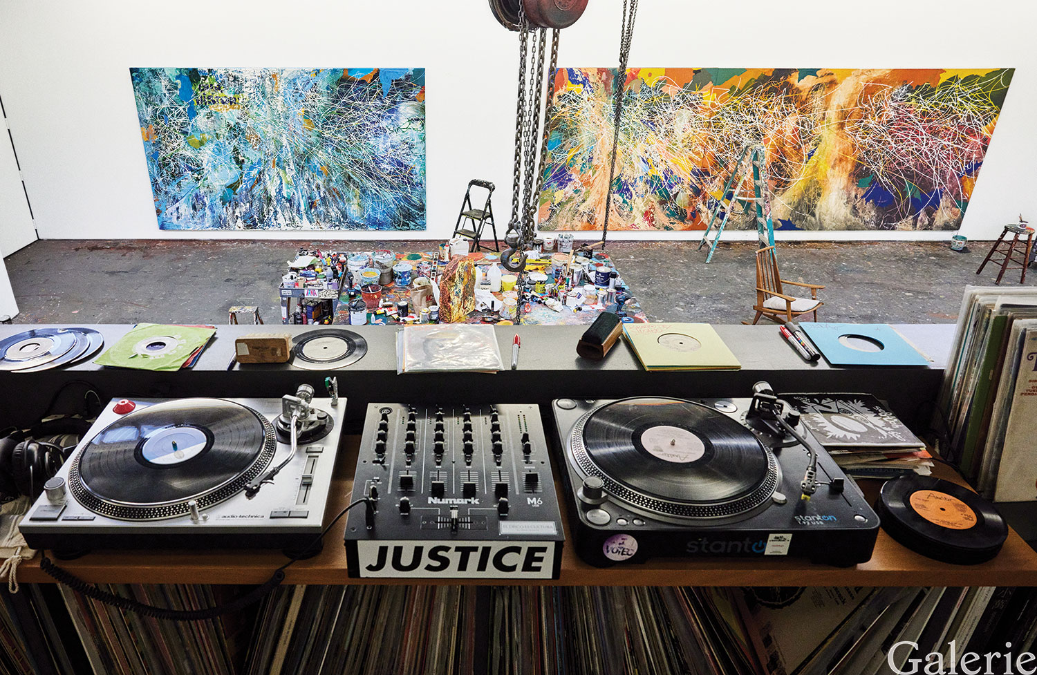 Turntables in the studio’s mezzanine lounge often play records.