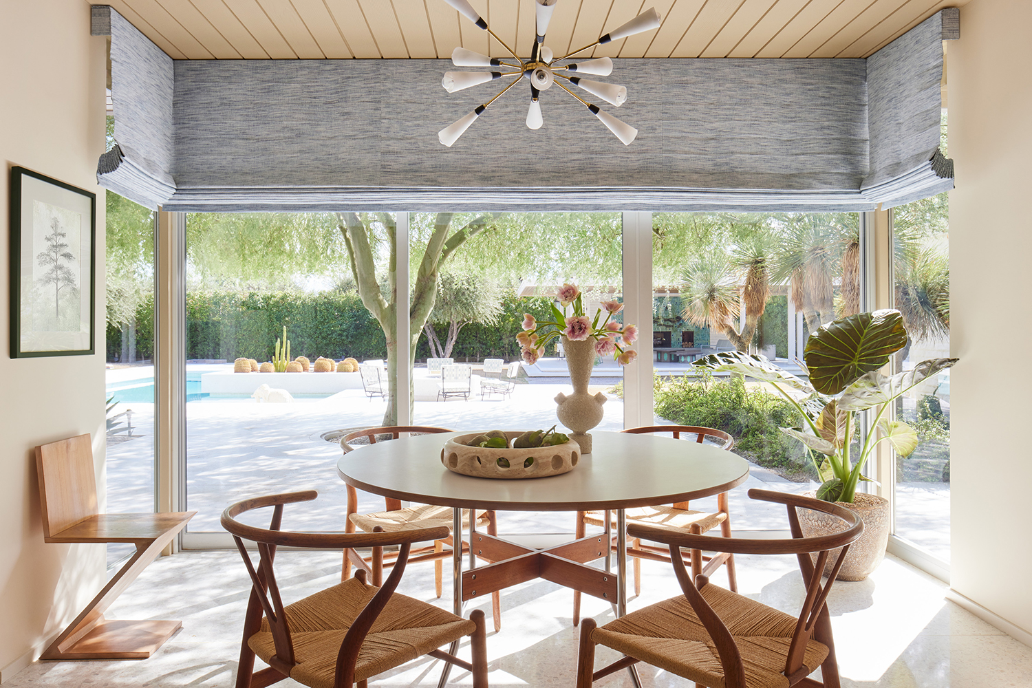 Flat Roman shades made using Cactus Weave in Indigo from the Martyn Lawrence Bullard Collection for The Shade Store.