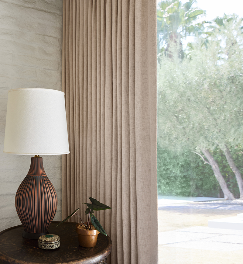 Curtains made using Mirador in Dune from the Martyn Lawrence Bullard Collection for The Shade Store.