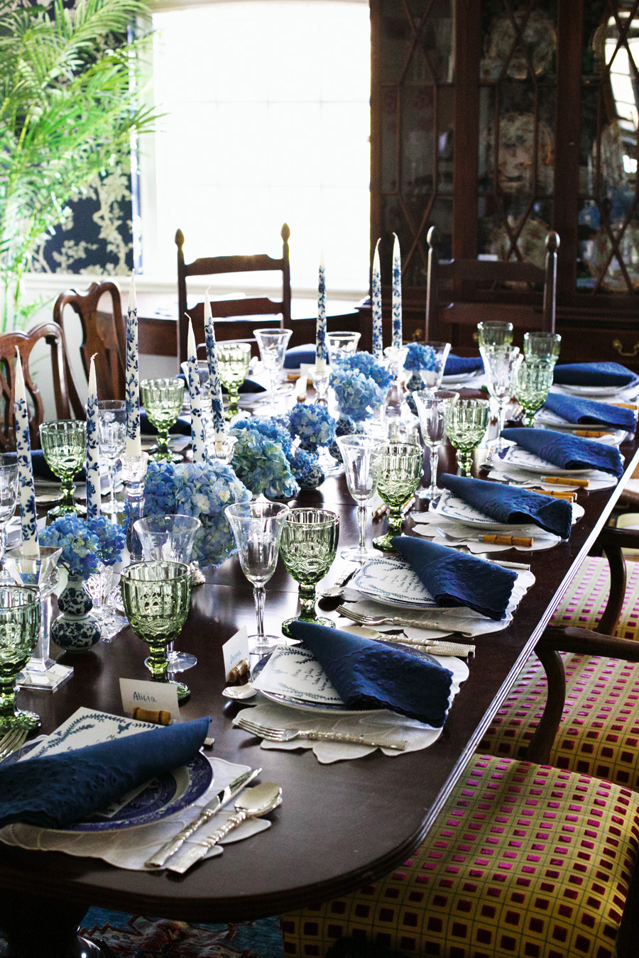 Blue and White Chinoiserie Dinner: Crisp blue and white linens, with matching hydrangeas and fine crystal, set the stage for a classically elegant party.