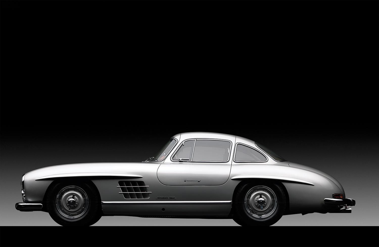 His 1955 Mercedes-Benz 300 SL gull wing coupe.