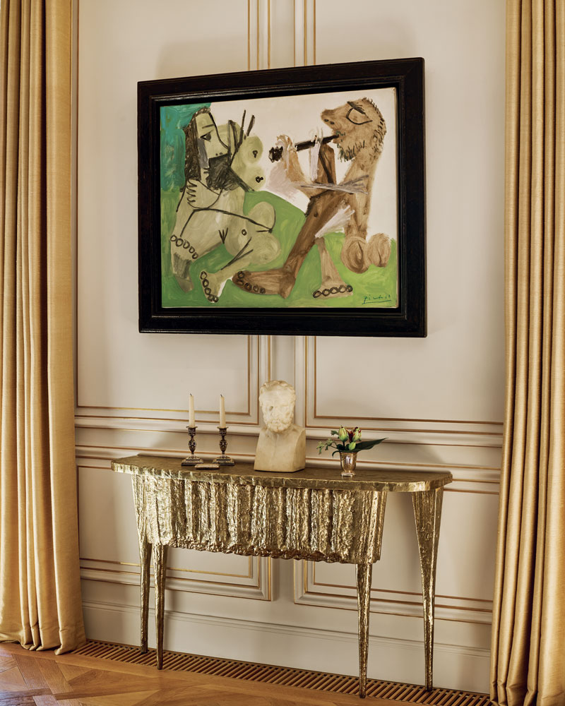 In one of the living rooms, Hazarian knew she needed a charismatic design element to balance a commanding painting by Pablo Picasso, titled Nu Assis et Joueur de Flûte. So in 2021, she conceived Shivini, a lustrous gold and polished-bronze console inspired by stalactites. Its off-kilter shape provides some zing to the otherwise classical feel of the space.