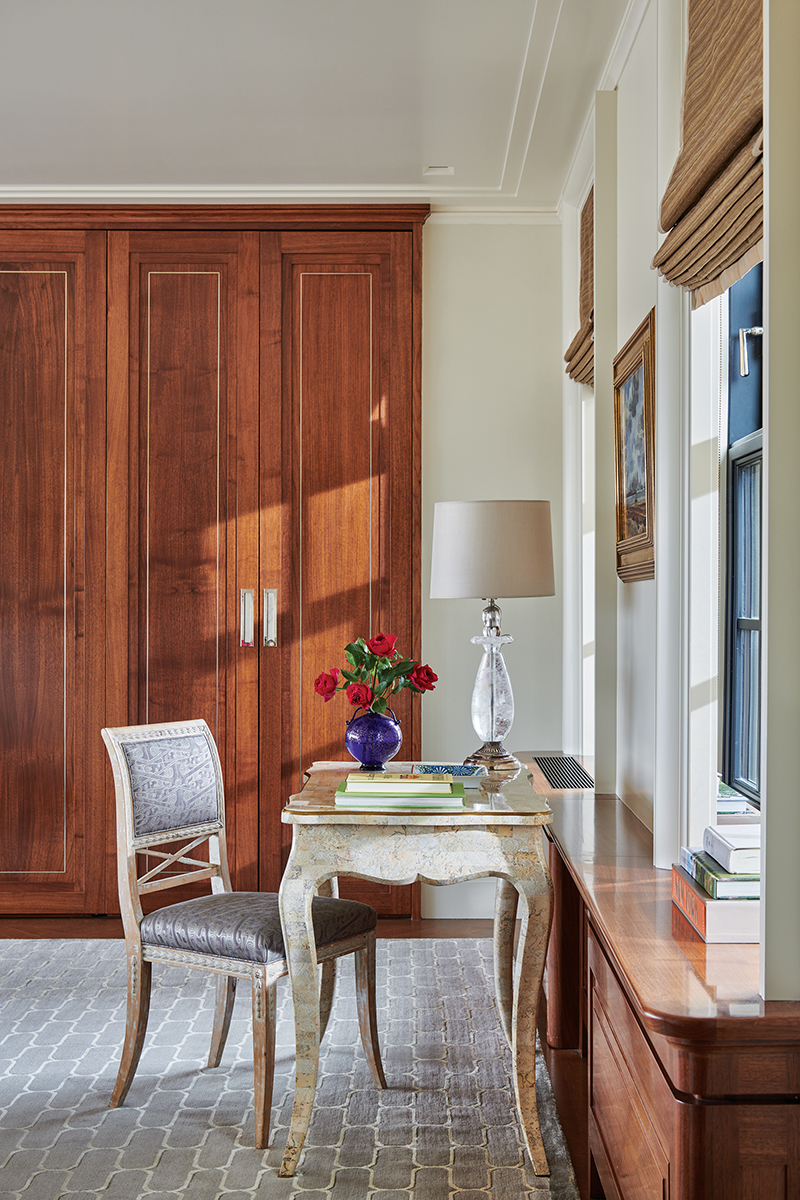 A midcentury Maison Baguès rock crystal lamp tops the primary suite’s vintage Maitland-Smith stone-and-brass writing desk, which is paired with a 19th-century Swedish Gustavian chair.