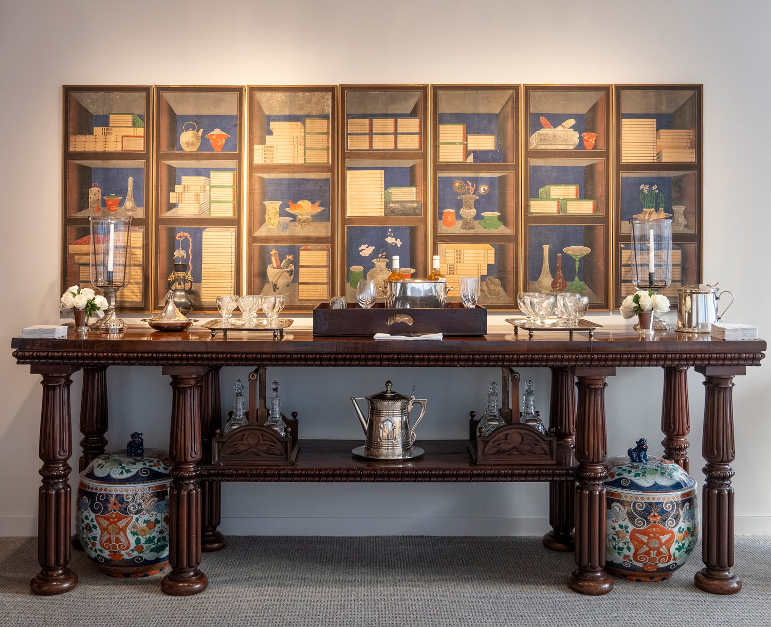 A George IV Mahogany Serving Table and Collected Bar Service.