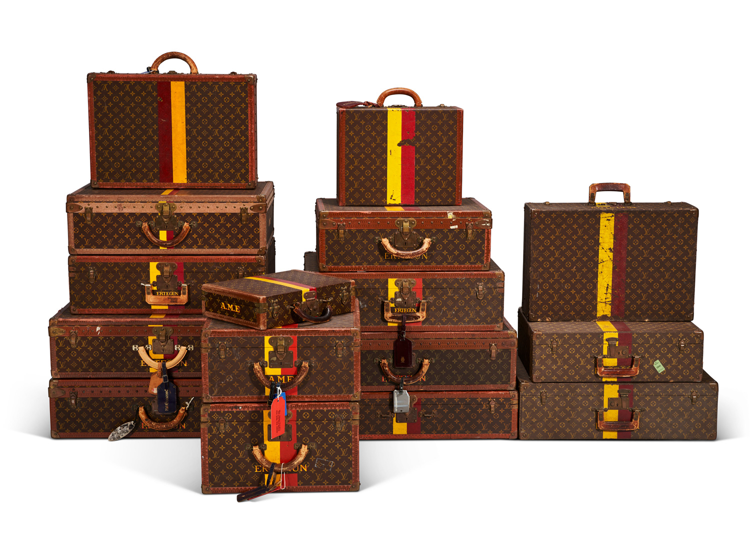 Monogrammed Louis Vuitton suitcases.