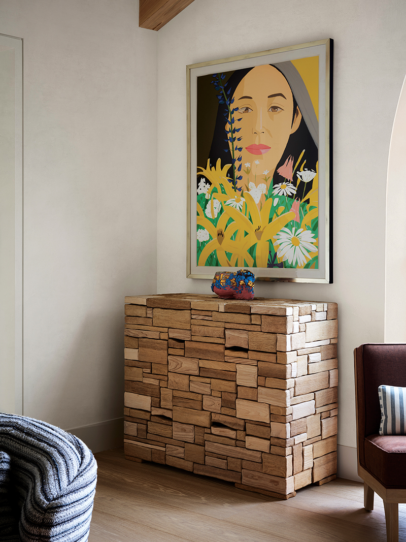 An Alex Katz artwork and a Mattia Bonetti chest enliven a corner of the family room.