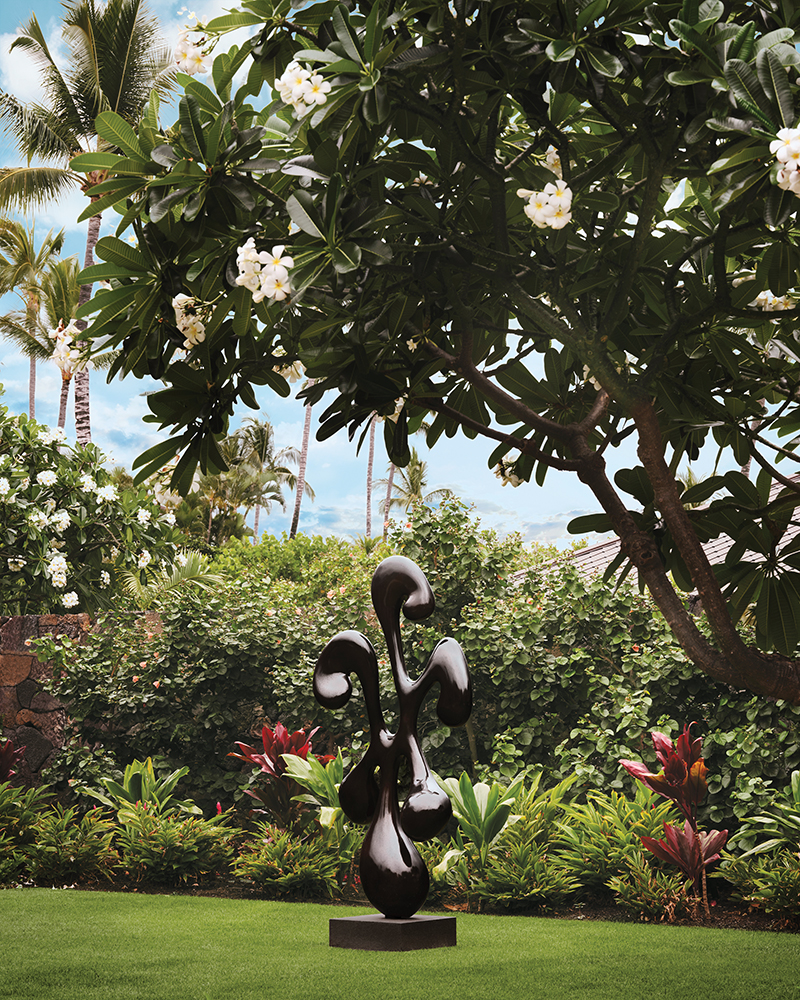 The homeowners commissioned the John Koga bronze sculpture that stands in the courtyard.