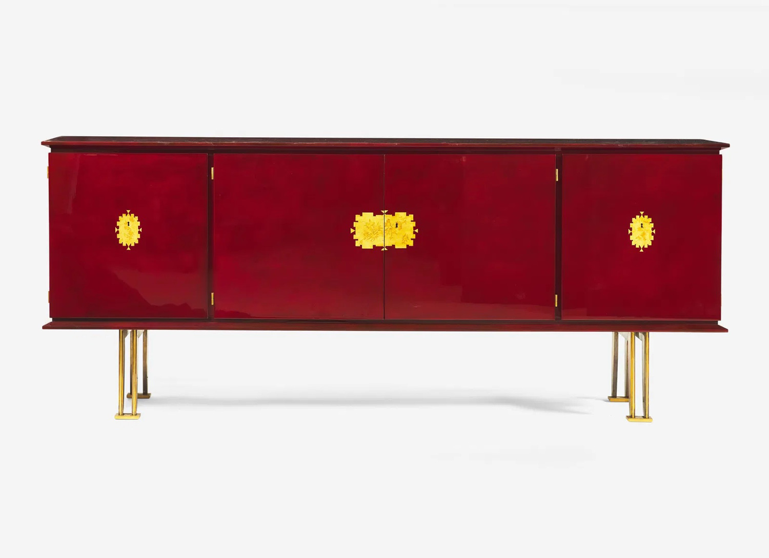 Red lacquered sideboard at Jules Leleu.