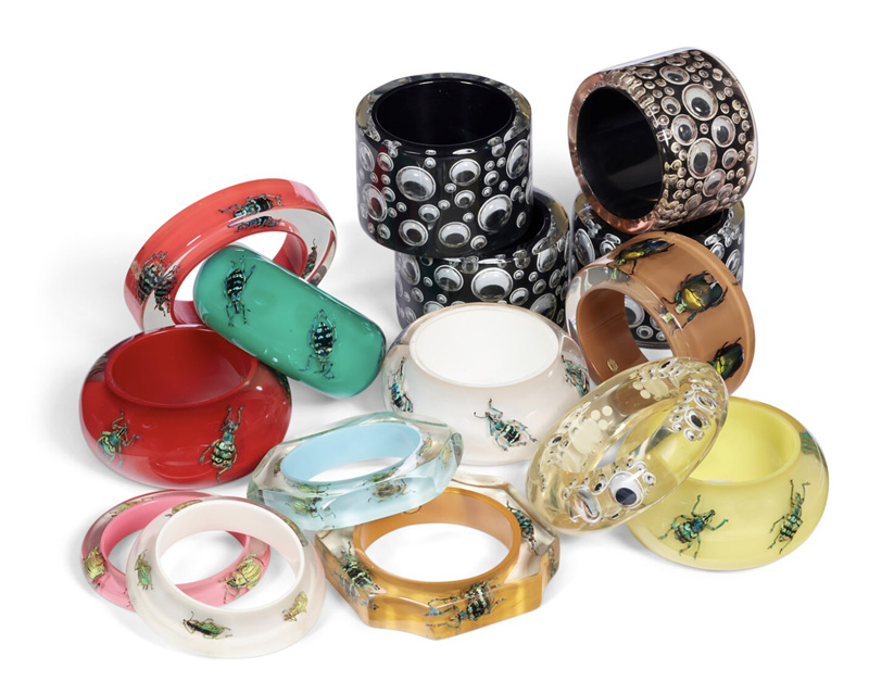 A group of multicolor lucite bangle bracelets from the Iris Apfel collection on auction at Christie's.