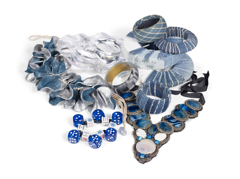 A selection of blue tone, mixed material and lucite costume jewelry from IRis Apfel auction at Christie's