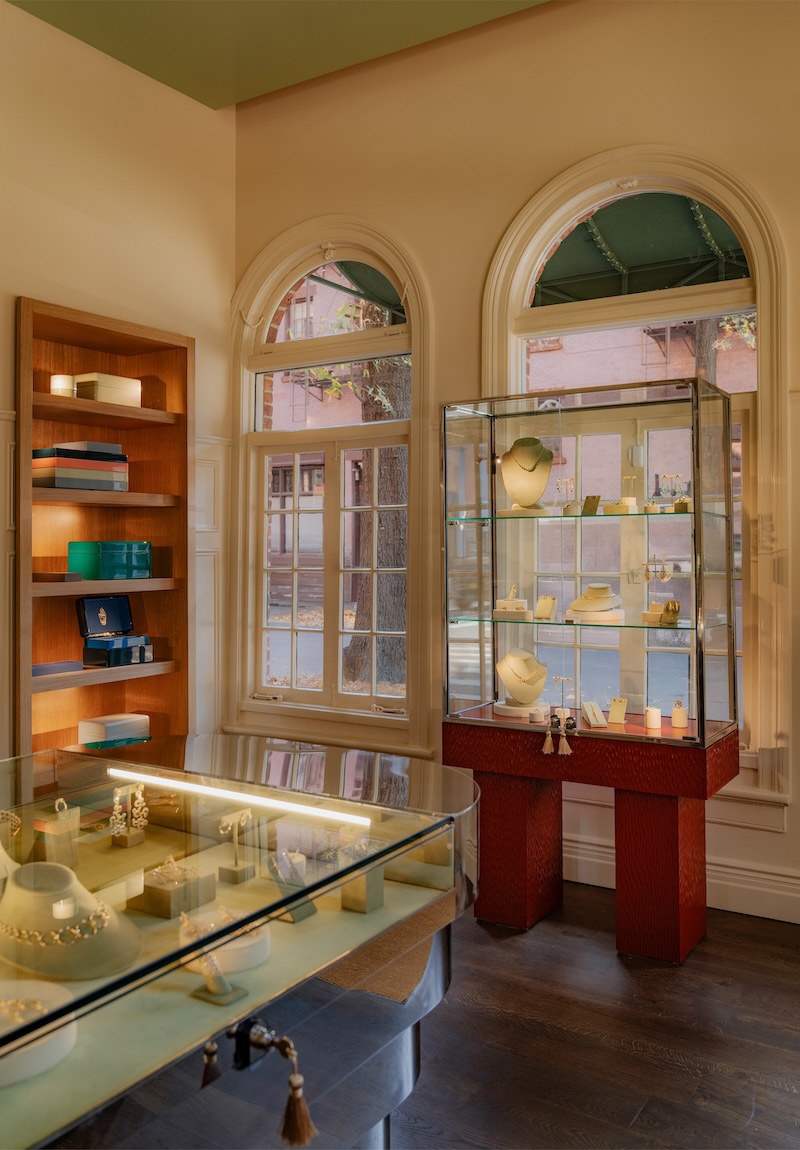 Trove interior with products displayed in glass and wood cases.