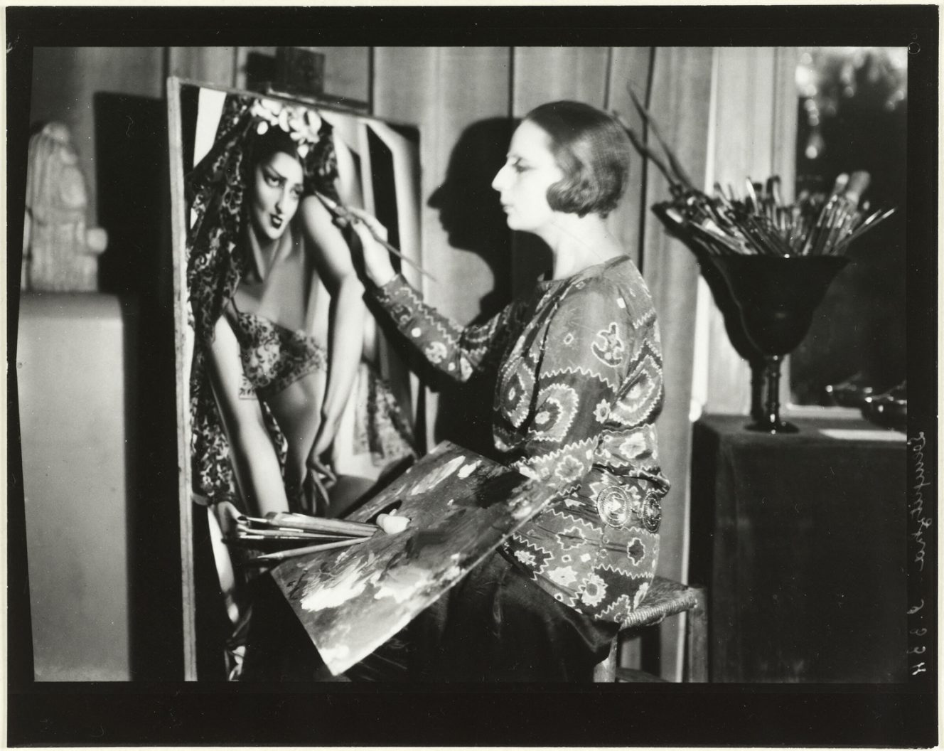 Thérèse Bonney, “Tamara de Lempicka working on the portrait Nana de de Herrera,” c. 1929.