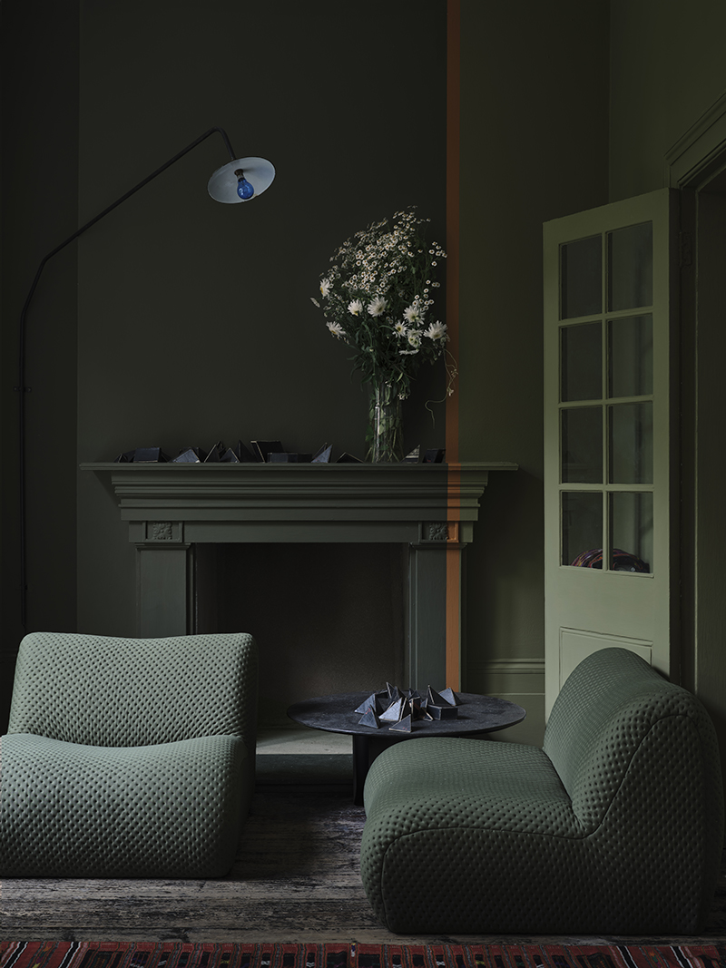 Walls, woodwork and fireplace enveloped in Reduced Green No.313, Marmelo No.316, and Dibber No.312 by Farrow & Ball.