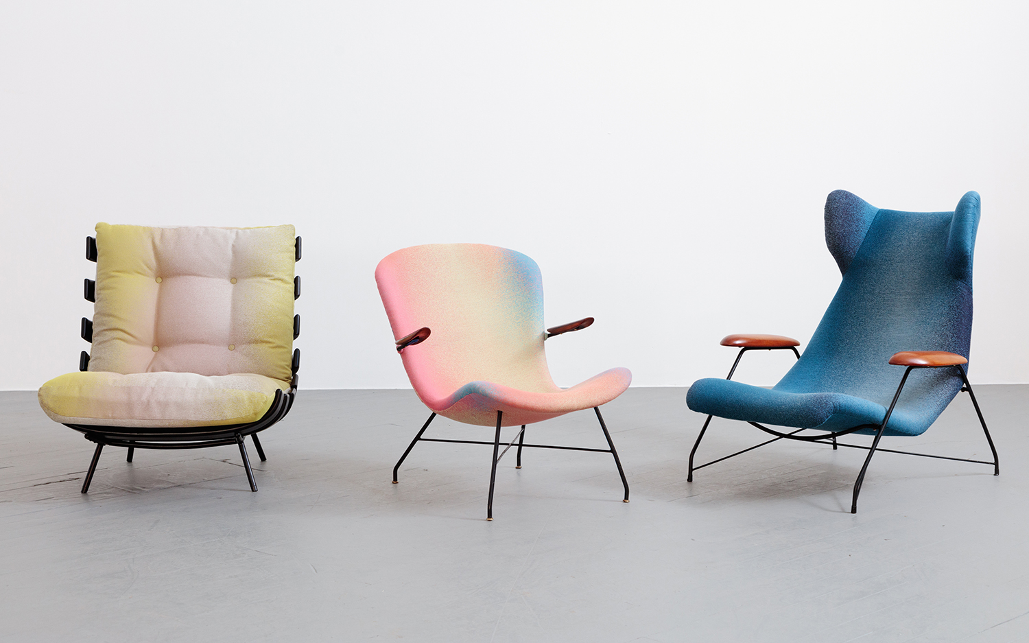 Pair of circa 1955 lounge chairs by Martin Eisler, upholstered in the new Nova collection of textiles by Sander Lak for Maharam.