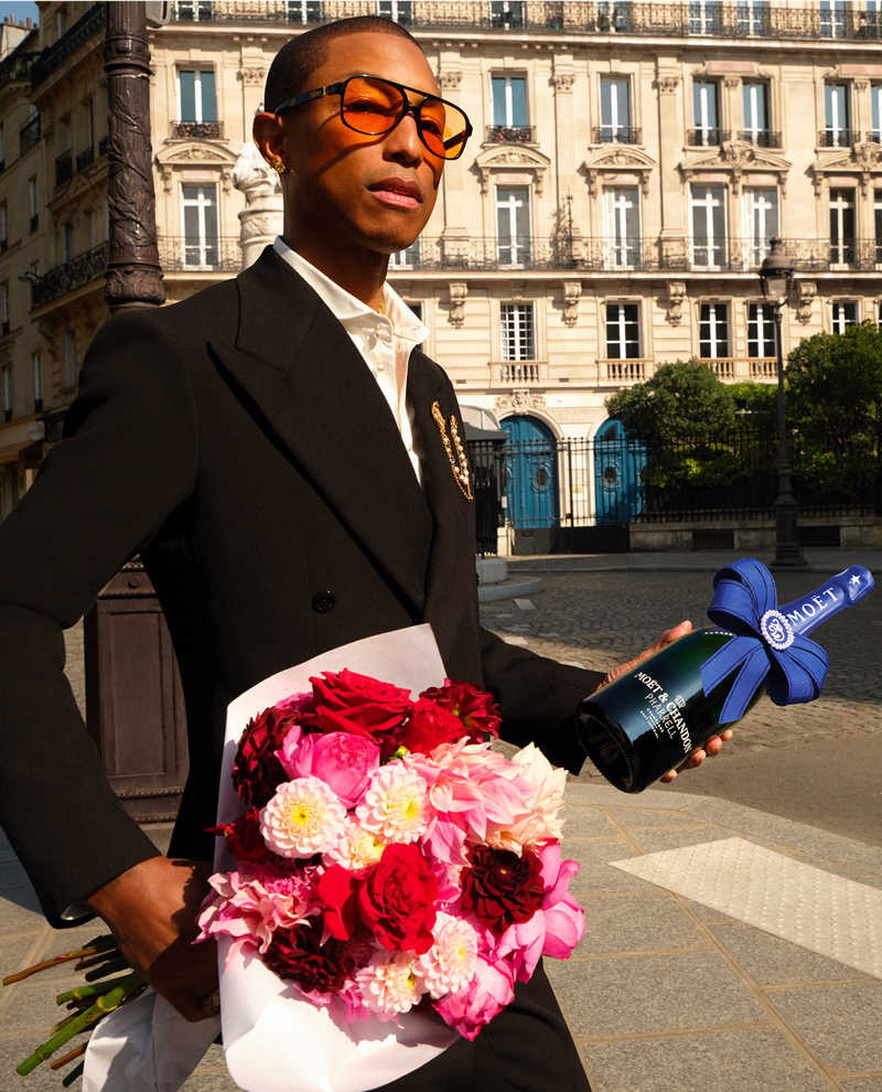 Pharrell Williams with the Limited Edition Blue Bow.