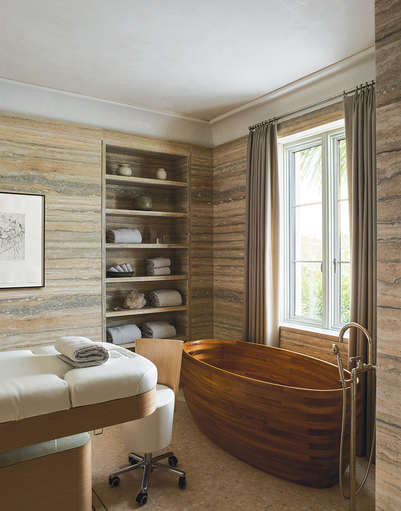 North of Palm Beach, Florida, Smith and Moore Architects enveloped a spa bath’s Zen massage area in a beautiful silver travertine and added a deep soaker tub made of teak.